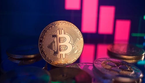 Strategies to avoid bitcoin trading risks Bitcoin coin placed on a reflective surface, with a trading chart in the background, symbolizing bitcoin trading and market analysis.