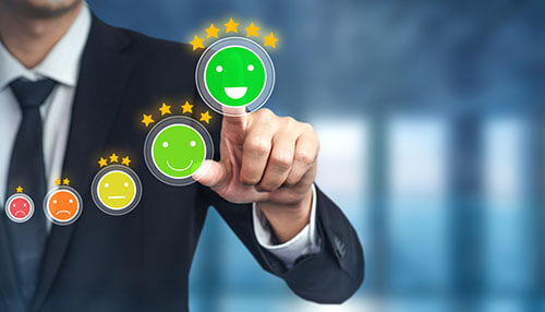 Feedback A business professional selecting a happy customer satisfaction icon, symbolizing effective customer retention strategies to improve business growth and customer loyalty.