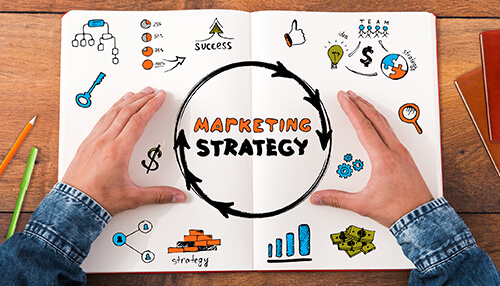 Changing the marketing strategy and adding to the business plan Marketing strategy sketchbook with charts and icons focused on boosting roi through smart planning.