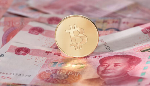Future of bitcoin trading in china - tycoonstory | tycoonstory media Physical bitcoin placed on chinese yuan banknotes, illustrating cryptocurrency investment, price movement, and cross-border bitcoin trading activity.