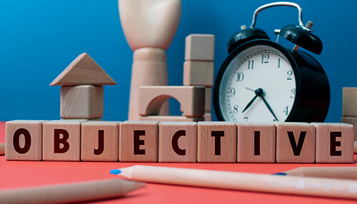 Setting up reachable objectives Objective planning blocks with a clock symbolizing business goals and roi improvement strategies.