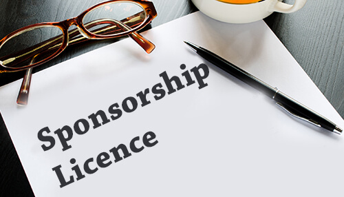Sponsorship licence - tycoonstory | tycoonstory media Document labeled sponsorship licence with pen and glasses, representing the certificate of sponsorship under a uk sponsorship licence.