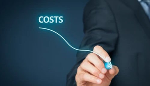 Cost - tycoonstory | tycoonstory media Business professional drawing a downward curve labeled costs highlighting strategies to reduce expenses and grow your business efficiently