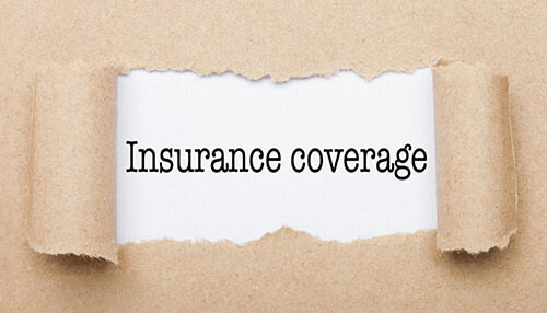 How does a g1 restriction violation impact your insurance coverage Torn paper revealing the words insurance coverage — highlighting insurance protection concept.