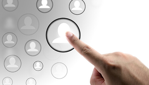 Improve recruiting Tech-savvy user interaction concept showing a finger selecting a digital profile icon on a virtual interface