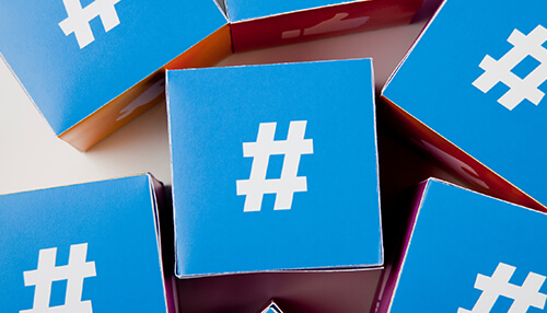 Colorful boxes featuring the hashtag symbol, representing the importance of selecting the best Instagram hashtags for boosting business growth and engagement.