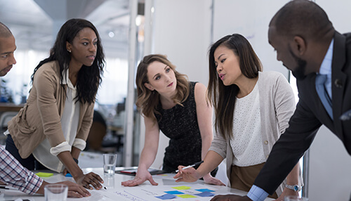 Financial support for startups in the us Diverse group of professionals collaborating in an office setting, brainstorming and planning, exemplifying the teamwork essential for startups in the u. S.