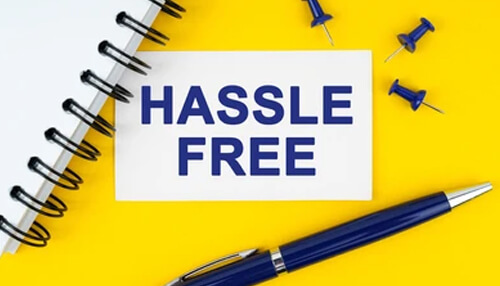 Makes processes hassle-free A sign reading hassle-free symbolizing the ease of using mobile applications developed through effective mobile app development.