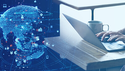Business overseas A person working on a laptop with a digital world map in the background, symbolizing the process to start a business overseas and expand globally.