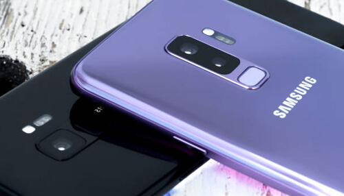 Samsung smartphone brand technology - tycoonstory | tycoonstory media Smartphone brands: two samsung smartphones, purple and black colored, fitted with advanced cameras.