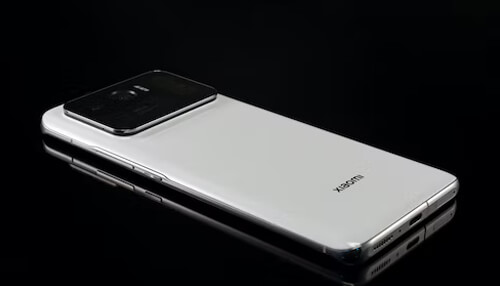 Xiaomi - tycoonstory | tycoonstory media Rear of a white-colored xiaomi smartphone, with a camera module on the back.