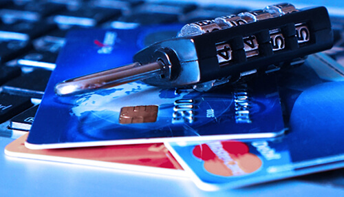 You have bad credit Small business loans security concept showing credit cards with a combination lock on top, representing protected financing and secure business funding options.