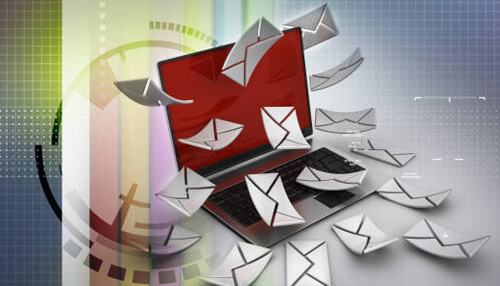Business email compromise Laptop surrounded by flying email envelopes, symbolizing spam email campaigns and malicious message distribution.
