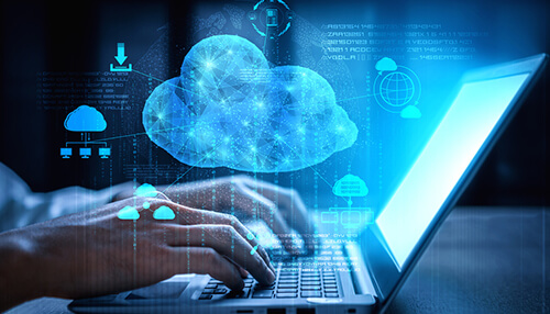 How do you back up data - tycoonstory | tycoonstory media Hands on the laptop with a glowing cloud and icons of data, representing managed service provider and cloud technology.