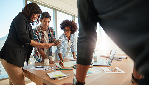 Project description Budget discussion in a business meeting as team reviews financial plans and cost allocations together
