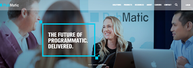 Pubmatic Pubmatic website homepage with a team meeting scene and text saying ‘the future of programmatic delivered,’ representing programmatic advertising solutions.