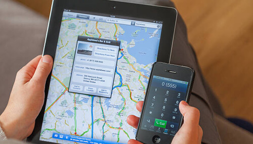 Using the google maps website or application Tablet and smartphone showing navigation route on google map interface with directions and contact details for a selected destination.