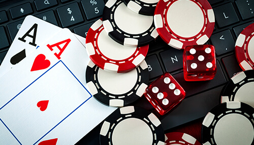 What are tether gambling sites Poker cards, chips, and dice on a keyboard, symbolizing online gambling with tether as the preferred currency.