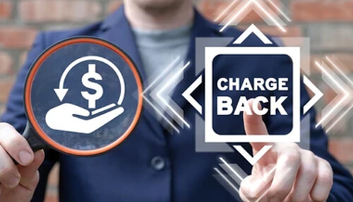 What type of information is included in a chargeback alert Chargeback alerts: a person holding a magnifying glass over a symbol of money and the word'CHARGEBACK,'.