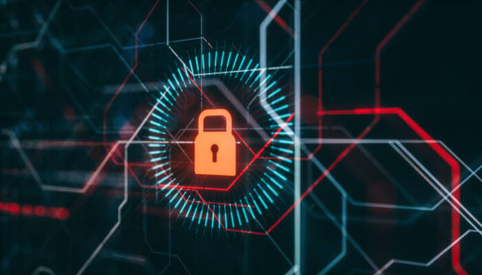 Cyber security threats A person is typing on a laptop with the screen displaying a white padlock icon within a blue globe-like network structure, with the words "cyber security" beneath it, emphasizing online protection.