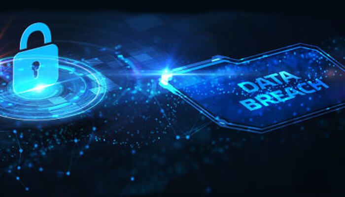 Data breach Cybersecurity: a dark, futuristic digital scene focused on a data breach, showing a glowing blue padlock next to a rectangular graphic with the text "data breach" on a network background, suggesting a failure in cybersecurity.