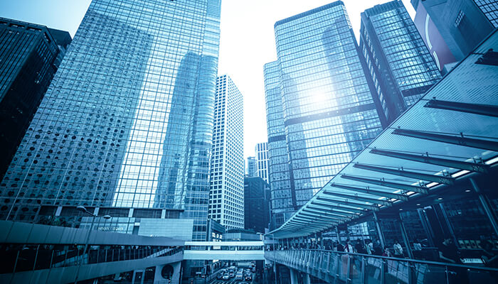 Modern skyscrapers representing global corporations and the urban environment where businesses incorporate and expand operations.