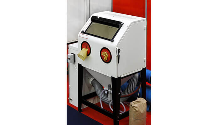 Benefits of wet blasting machine for your business A compact wet blasting machine used for precision surface cleaning and finishing, ideal for businesses requiring detailed and efficient material preparation.