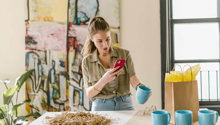 Businesses Entrepreneur managing handmade products and online orders, representing modern home-based businesses and digital selling.