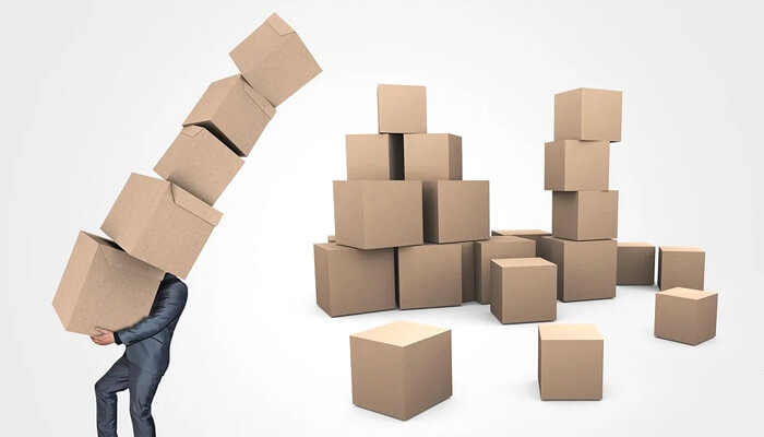 Finding the resources and tools for continued success Stacked boxes symbolizing task overload and organization challenges streamlined through clickup project management.