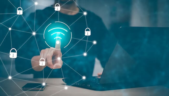 Secure internet connection User activating digital security controls on a laptop to prevent fraudsters from accessing sensitive data and online accounts.