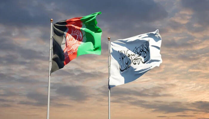 The new bloc is being merged in afghanistan The flag of afghanistan (left) alongside the taliban flag (right), symbolizing the shift in authority and governance in afghanistan under taliban rule.