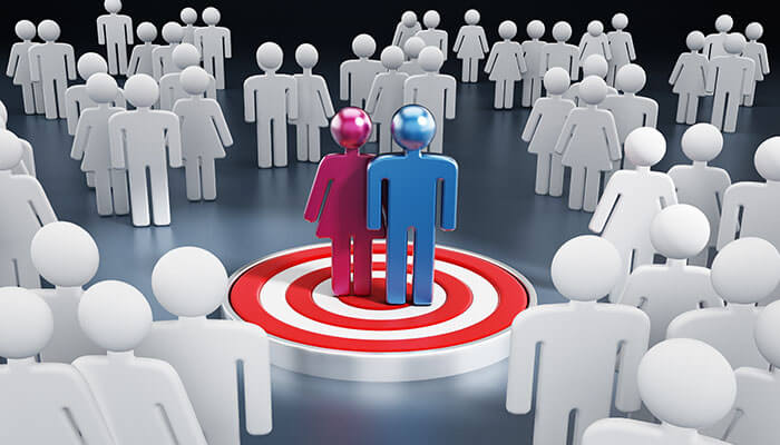 Planning a marketing Planning a marketing concept illustrated by a target audience selection with highlighted figures standing on a bullseye surrounded by a crowd.