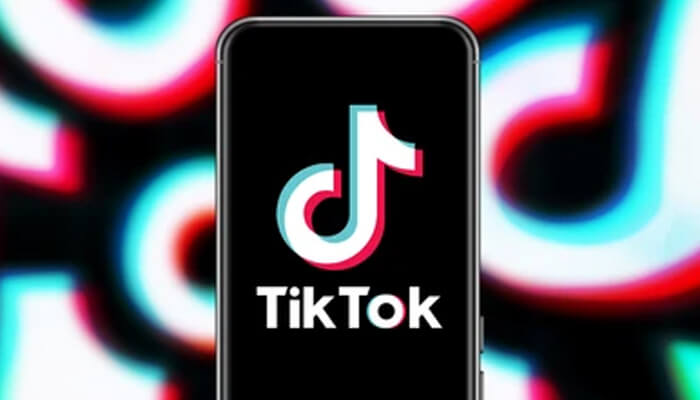 Could the us government genuinely prevent individuals from using tiktok Smartphone displaying the tiktok logo with vibrant neon-colored background, representing the popular social media platform.