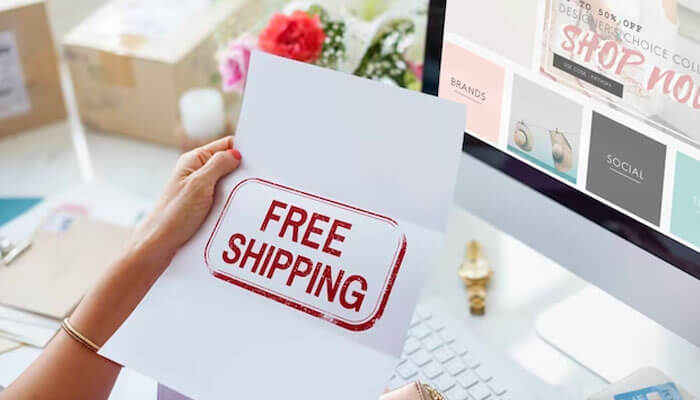 Free shipping - tycoonstory | tycoonstory media A person holding a'FREE SHIPPING' offer on a paper while viewing an online store, symbolizing promotions and customer incentives in e-commerce.