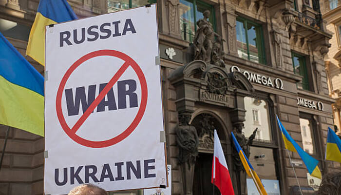 Russia and ukraine Protest against the war, with a sign stating'Russia and Ukraine crossed out, calling for peace and an end to the Russia-Ukraine conflict.