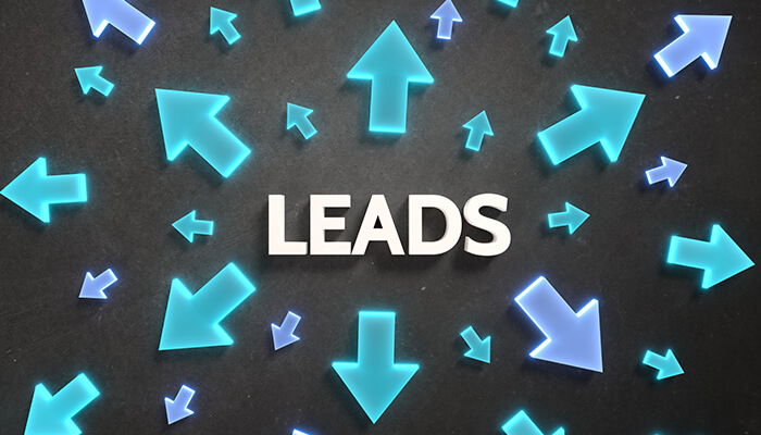 Not-producing-leads-tycoonstory | tycoonstory media The word'Leads' surrounded by glowing arrows pointing in various directions, representing lead generation and marketing growth.