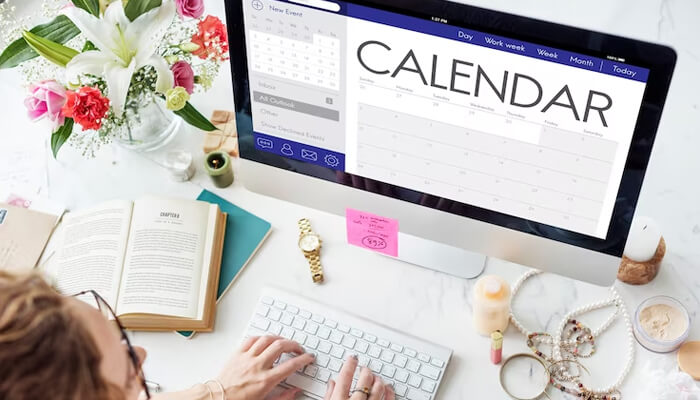 Sync-with-other-calendars-tycoonstory | tycoonstory media Scheduling software dashboard being checked daily on a laptop, displaying appointment updates, calendar management, and real-time schedule adjustments.