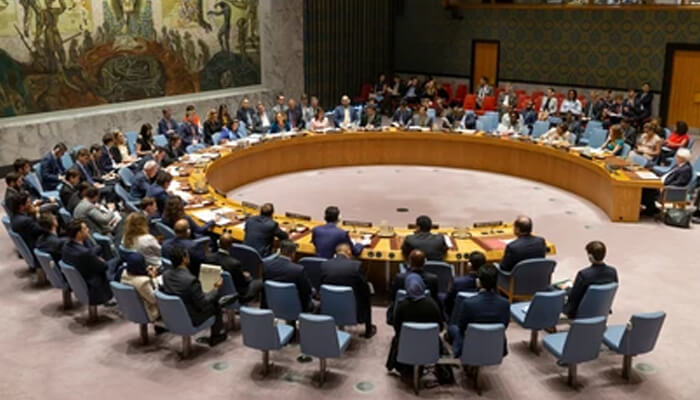 Un-security-council-tycoonstory | tycoonstory media Large international council meeting with diplomats seated in a circular arrangement, discussing global issues including ukraine.