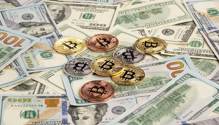 Bitcoincash-tycoonstory | tycoonstory media Mixed bitcoin coins placed over us dollar bills, reflecting crypto and fiat currency value trends in the crypto casino market.