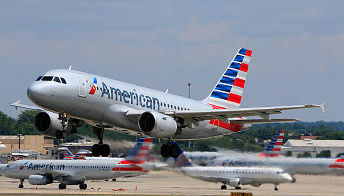American airlines American airlines plane taking off, showcasing the airline's fleet in action at an airport.