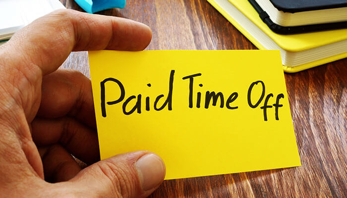 Paid time off also serves as a great compensation Employees benefit concept showing a note labeled paid time off, highlighting workplace policies and employee benefits.