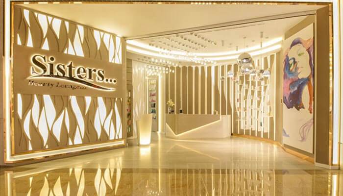 Sisters beauty lounge A modern and stylish entrance to'Sisters' beauty lounge, showcasing contemporary design elements that invite customers into a luxurious salon experience.
