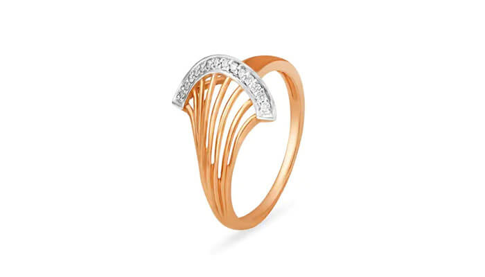 14kt rose gold finger ring with diamonds - tycoonstory | tycoonstory media Gold ring with artistic curved lines and diamonds forming a stylish modern jewelry design.