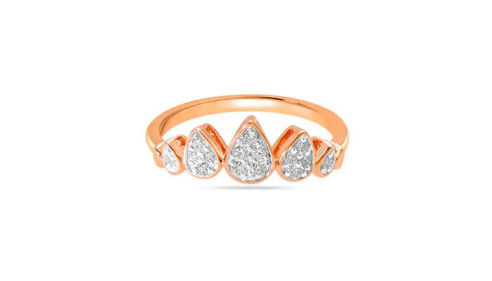 14kt rose gold glistening rain droplet diamond finger ring - tycoonstory | tycoonstory media “rose gold ring featuring multiple teardrop-shaped diamond clusters in a crown-style arrangement
