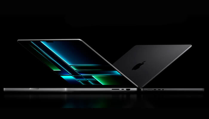 Apple macbook air m2 - tycoonstory | tycoonstory media Apple laptops side by side in a dark setting, highlighting premium design and features in laptops.