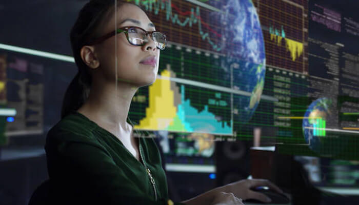 Environmental monitoring Woman analyzing environmental monitoring data on a high-tech computer, visualizing global data trends to assess environmental impact and sustainability