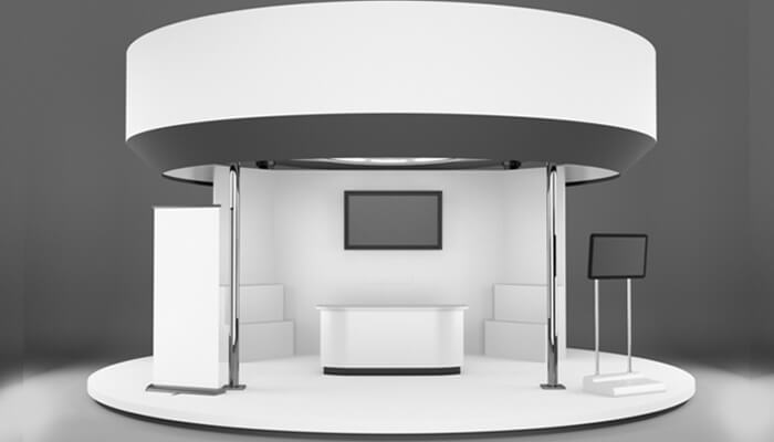 Trade Show Sleek Trade Show exhibition stand featuring a circular canopy, digital screen, and clean white presentation space.