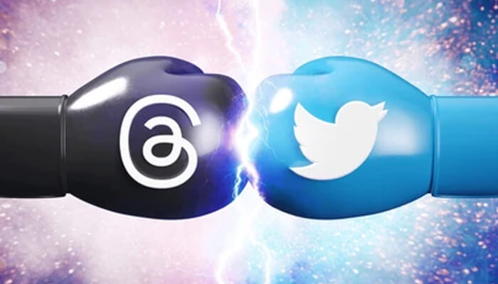 Rival app - tycoonstory | tycoonstory media Symbolic clash between threads and twitter (x) logos shown as boxing gloves, representing social media competition and tech industry rivalry linked to elon musk.