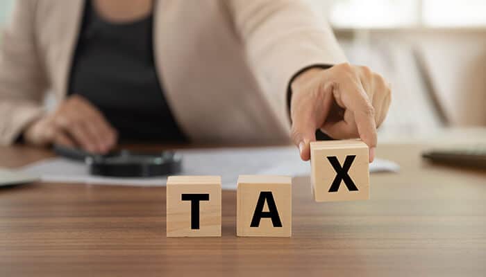 Tax provision - tycoonstory | tycoonstory media An insurance document with a stethoscope and pen, symbolizing a term insurance plan for health and life protection.