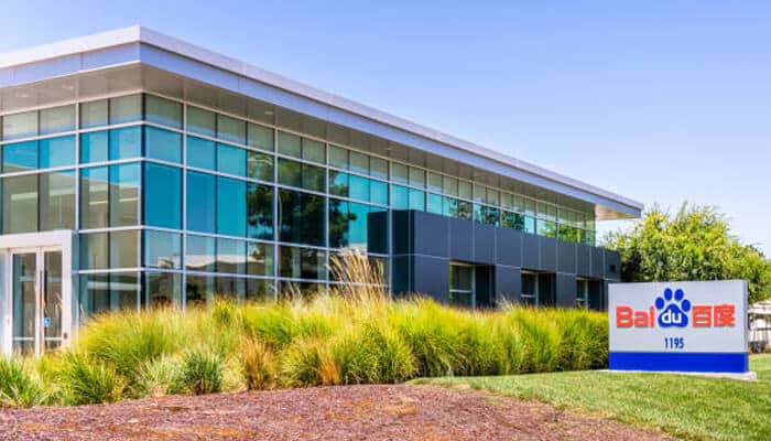 Robin li Baidu office building with modern architecture and company signage, representing the headquarters of robin li tech empire.